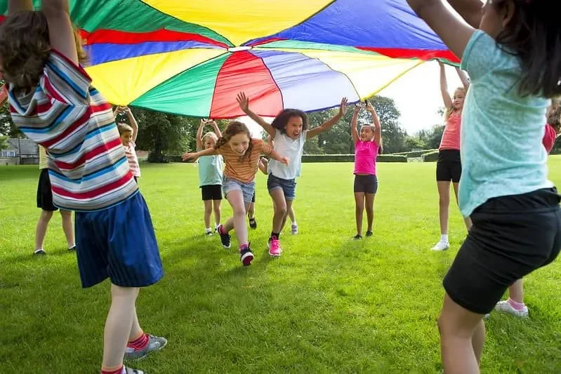 Children under parachute